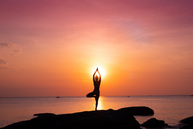 asian girl with yoga wear malaysia at the sunset